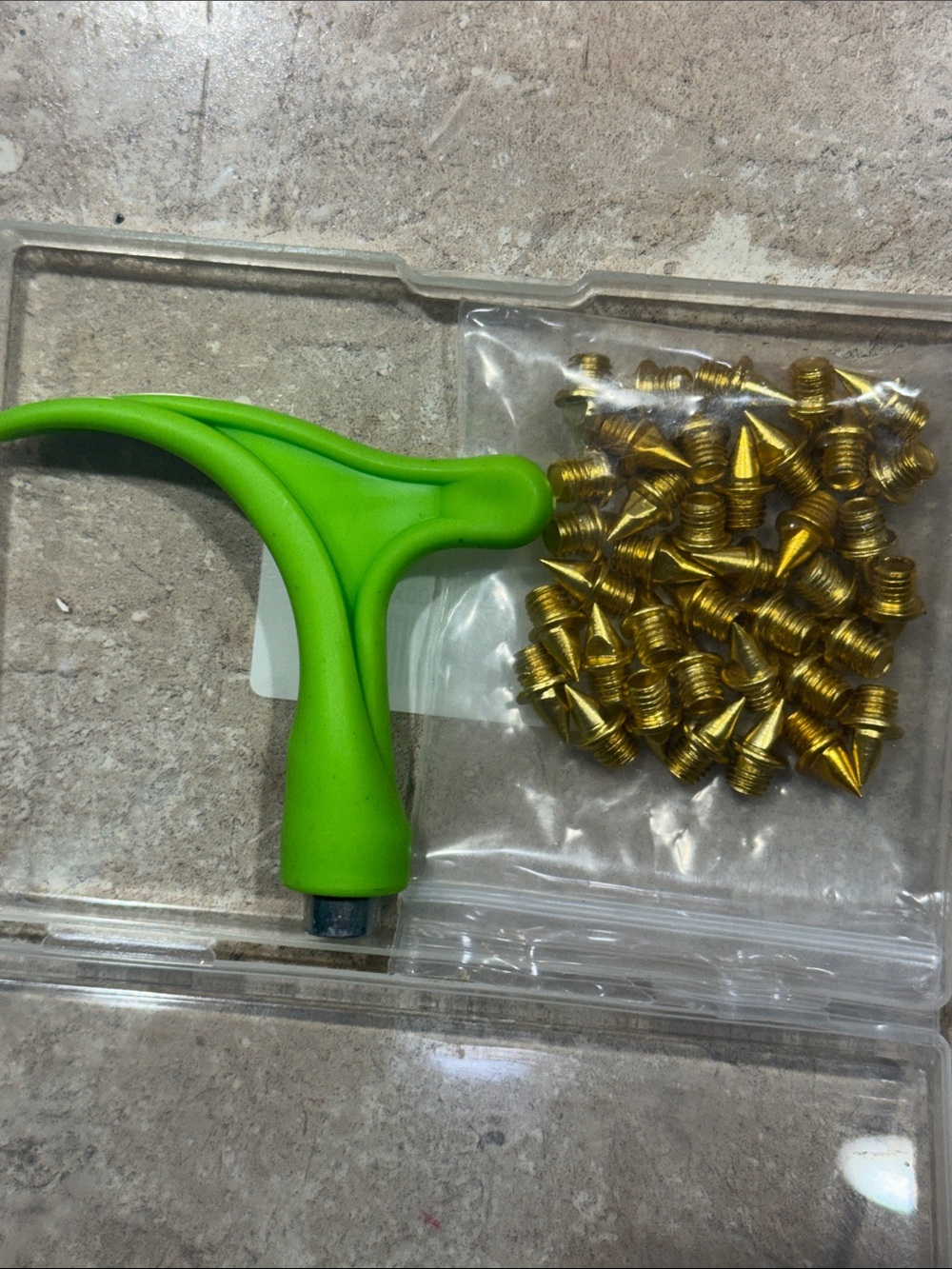 38 gold spikes for shoes